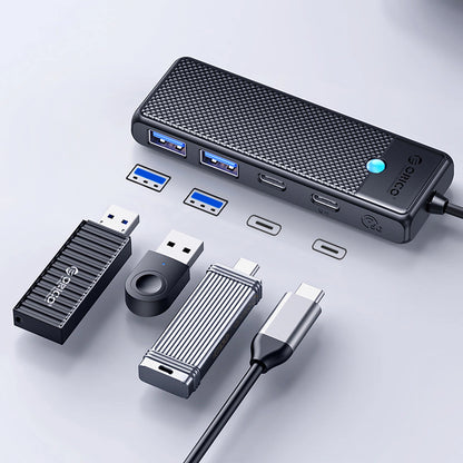 Hub USB-C Orico PAPW2AC-C3, 2 x USB-A 3.0 - 2 x USB-C, černý