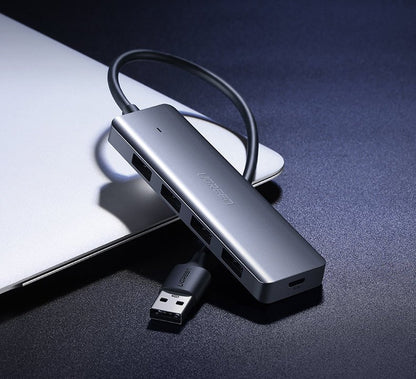 USB hub UGREEN CM219, 4 x USB-A 3.0 - 1 x USB-C, šedý